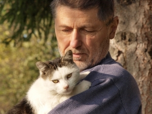 Man holding cat