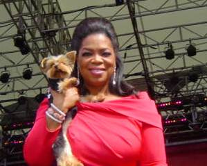 Oprah with a dog in NY